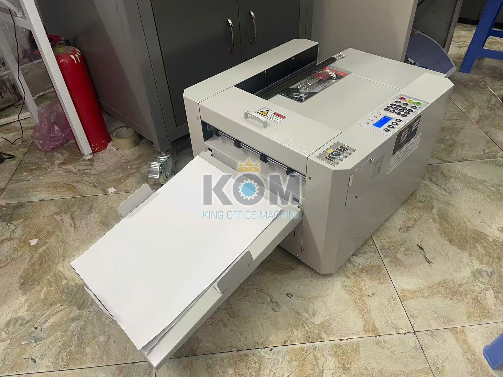 may can gan bia sach ban tu dong